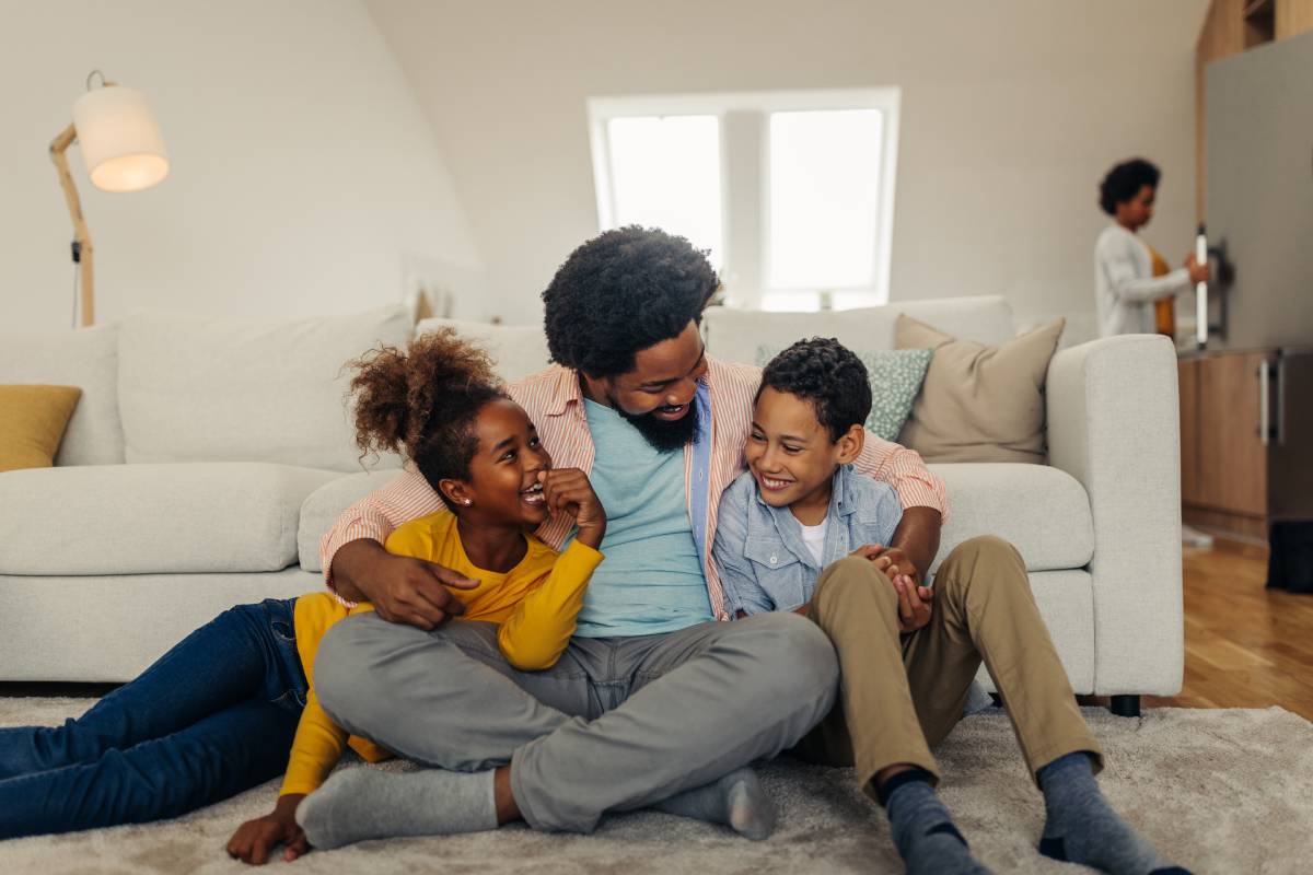 happy family in clean home after house cleaning