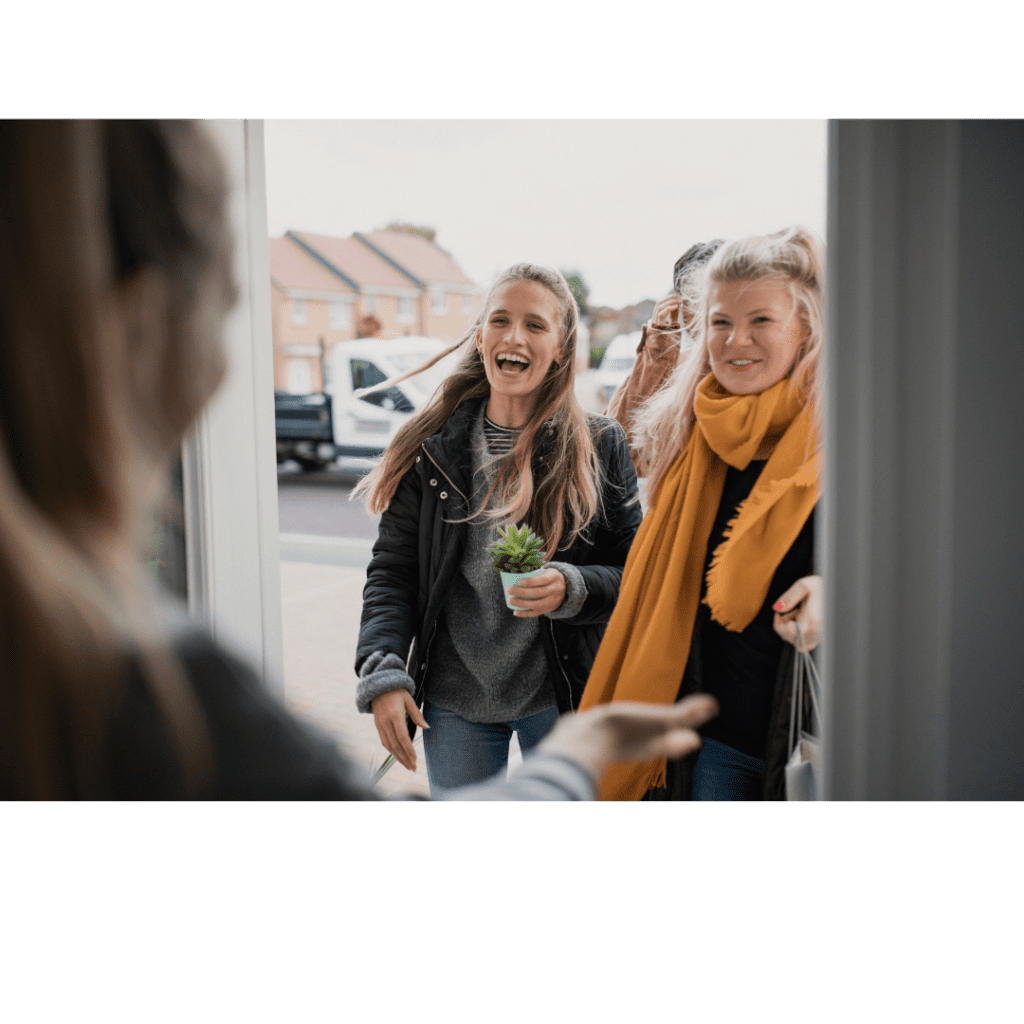 Homeowner opens door to receive two guests